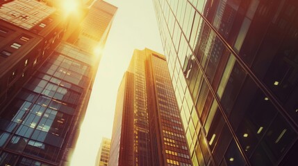 A view of tall skyscrapers bathed in the warm golden glow of sunlight, epitomizing urban modernity and architectural grandeur.