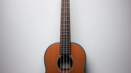 Elegant Brown Ukulele Closeup on White Wall - Minimalist Music Concept for Musical Instrument Promotion