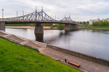 View of the Old Volga Bridge across the Volga River from the city embankment. Tver, Russia.