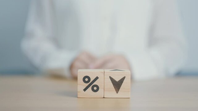 wood block of percentage change to UP and Down arrow. Interest rate, GDP, stocks market, financial, deflation and Inflation, ranking, mortgage, debt, Loan and Economic Recession concept