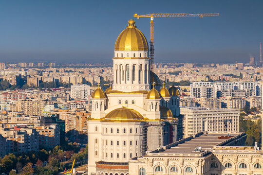 National Cathedral. Aerial view with the national orthodox cathedral (Catedrala Manturii Neamului in Romanian) with Palace of the Parliament in foreground. Landmarks of Bucharest.