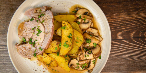 RECIPE VEAL ROAST, FRIES AND MUSHROOMS WITH SAUCE. High quality photo