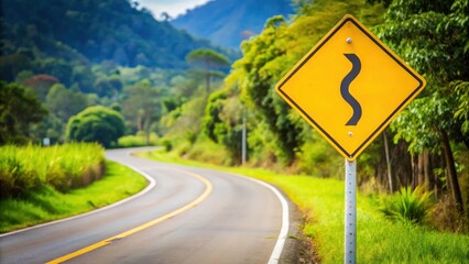 Yellow winding road sign on roadside in rural Thai countryside