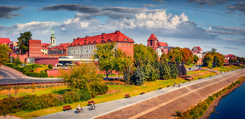 Spectacular summer cityscape of Torun town, Poland, Europe. Picturesque morning view of еру quay...