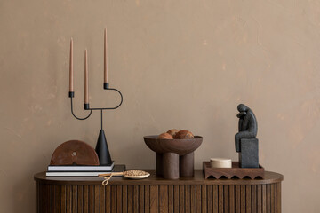 Elegant Sideboard Arrangement. A stylishly decorated wooden sideboard with minimalist accents and decorations. Perfect for highlighting modern interior design trends.