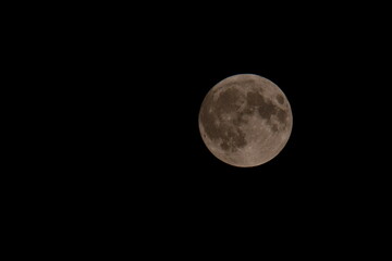 Full Harvest moon in the night sky, Kilkenny, Ireland.