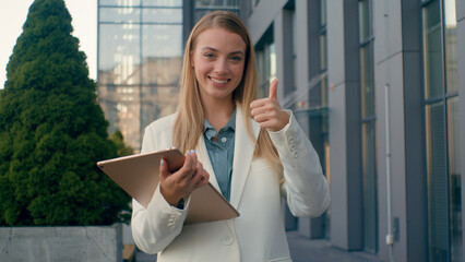 Smiling Caucasian businesswoman woman happy female girl employer corporate worker manager hold...