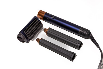 Professional hair styler, including a brush and hair dryer for drying hair, smoothing, and creating...
