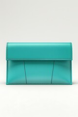 A trendy turquoise leather clutch with a modern design, isolated on a solid white background, front view