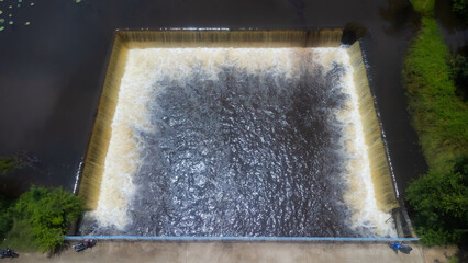 Natural water barrier in the rainy season .Panorama on the dam in the rainy season. Flood situation Overflowing after heavy rains. Before the big flood.