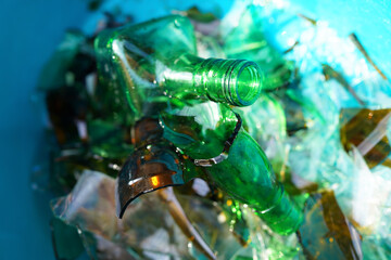 Broken glass bottles, background, texture. Broken glass bottles for recycling. Background of broken...