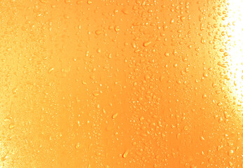 Drops on yellow background. Water drops on orange background. Shades of yellow orange colour....