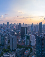 Obraz premium Aerial view of Shanghai Downtown skyline, highway roads or street . Financial district and high-rise buildings at sunset