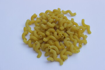 pasta elbows on a light background
