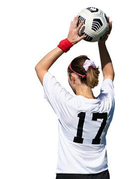 Isolated female soccer player preparing to throw a ball 