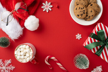 A vibrant red background featuring Christmas treats and decorations, including cookies, marshmallows, and gifts, perfect for holiday celebrations