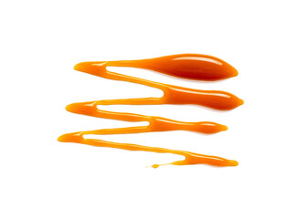 sweet caramel sauce isolated on white background Top view or flat lay. Caramel isolated on white...