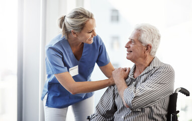 Patient, nurse and woman with support, wheelchair and conversation with healthcare, recovery and compassion. Old man, professional and person with disability, rehabilitation and healing with service