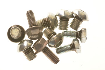 still life of bolts and white background