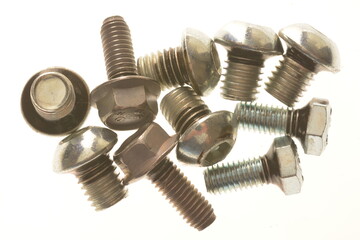 still life of bolts and white background