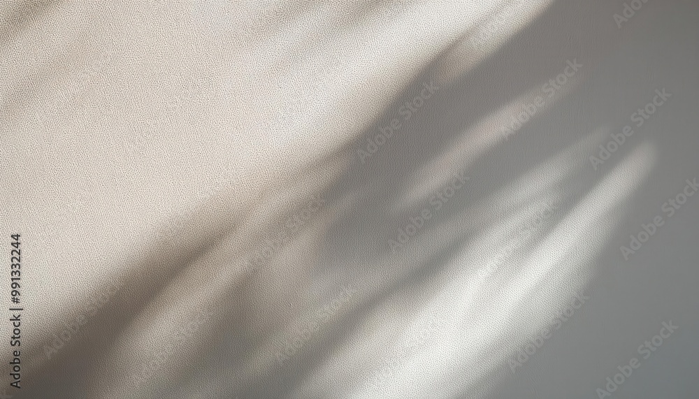 Poster Soft Sunlight Casting Gentle Shadows on Textured White Wall. Minimalist Natural Lighting Effect Creating Calm and Serene Atmosphere with Smooth Transition from Light to Shade. Background For Product 