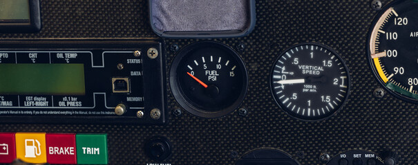 Airplane dashboard, fuel indicator. Fuel pump icon. gas gauge dashboard in Plane with warning sign...