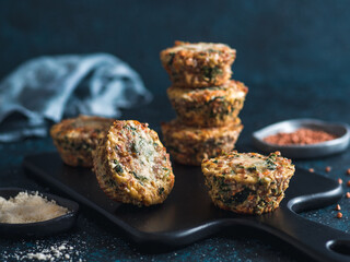 Buckwheat casserole with spinach,carrot,parmesan cheese.Baked eggs with buckwheat,vegetables and cheese.Ideas and recipes healthy easy breakfast,lunch,kids meal,snack - vegetables muffins.Copy space