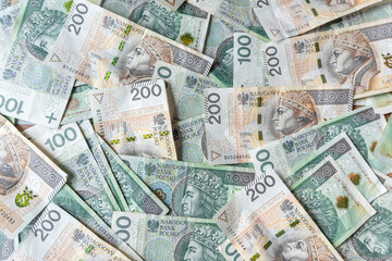 100 200 PLN zloty polish cash money banknotes background
