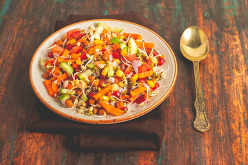 A vibrant, nutrient rich salad combining fresh greens, crisp vegetables, tangy dressings, crunchy toppings, and balanced Flavors for refreshment.
