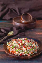 Vibrant Quinoa Salad with Fresh Vegetables, Tangy Citrus Dressing, Crunchy Nuts, Avocado, and a Zesty Herb Infusion.