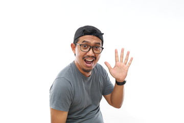 Naklejka premium Asian man wearing casual shirt and glasses showing with fingers number five while smiling confident and happy.