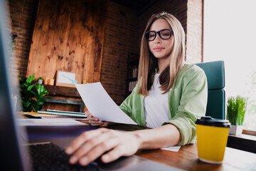 Photo of positive good mood lady specialist dressed shirt reading document working modern device...
