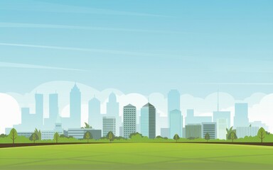 City skyline park. Green grass park with city skyline in background.  Urban landscape with nature.