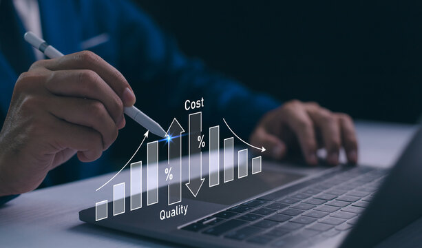 Cost and quality control, business strategy and project management concept. Businessman use computer laptop with quality control growth graph and cost reduction, control budget cost and improvement.