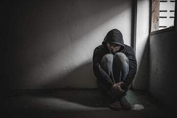 Asian man addict drug in the deserted place,A junkie feels alone in this world,Sad young man...