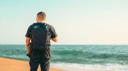 person standing on the beach