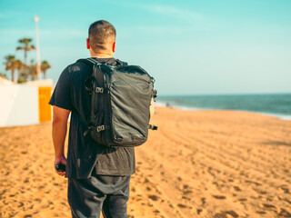 man walking on the beach