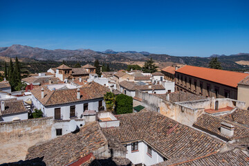 Aerial view of white houses in the ancient town of Ronda, Spain.