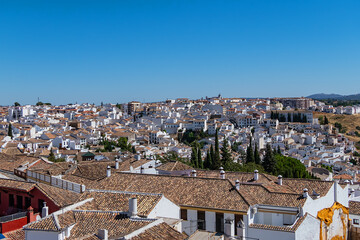 Aerial view of white houses in the ancient town of Ronda, Spain.