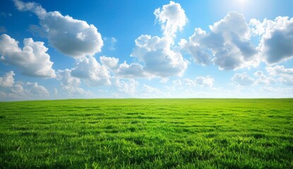 Obraz premium A serene landscape featuring a blue sky with white clouds above lush green hills, creating an idyllic scene perfect for relaxation and nature exploration, evoking calmness and tranquility.