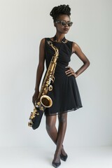 A woman in a black dress holding a saxophone, ready to play