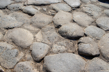 stone wall background, on the ground.