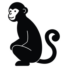 Obraz premium a black silhouette of a monkey. The monkey is sitting on its hind legs with its front paws on the ground and its tail curled around its body