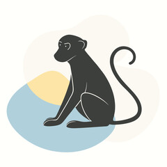 Obraz premium a black silhouette of a monkey. The monkey is sitting on its hind legs with its front paws on the ground and its tail curled around its body