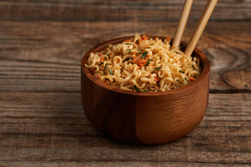 Pad Thai in a wooden bowl