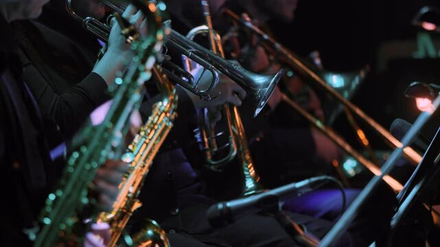 Brass Section in Orchestral Concert Musicians Playing The Trumpet Instrument.