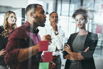 Sticky notes, thinking and brainstorming of group, office and collaboration of employees for stock market. Discussion, trader and people with ideas, ambitious and planning for investment opportunity