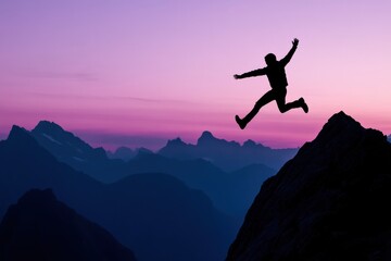 Silhouette of a person jumping between mountains during a colorful sunset