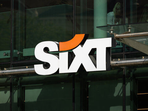 HANNOVER, GERMANY - 9. September 2024: Sixt logo sign of the car rental service on a building exterior. German company and from Pullach with a multinational business offering mobility services.
