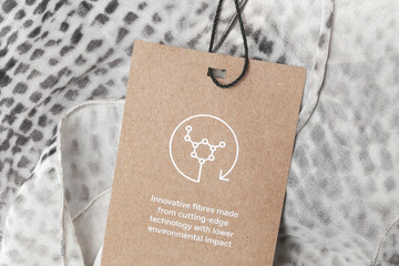 Label on clothes for Cutting-Edge Technologies in Fashion Industry, sustainable fabrics designed to reduce environmental impact. Recycled materials, organic textiles, and biodegradable fibers.